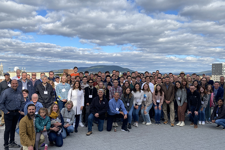 Alumni on rooftop of Walker Building